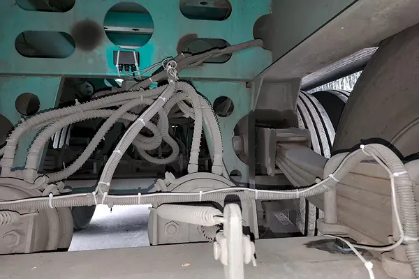 Harness routing along the chassis rail